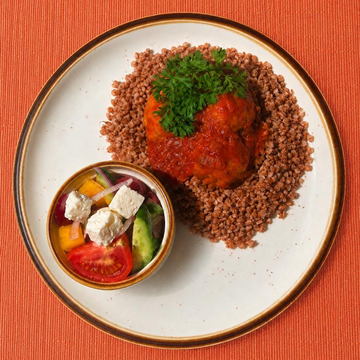 Chicken Meatballs with Buckwheat & Mediterranean Salad Chicken Meatballs with Buckwheat & Mediterranean Salad at Café Dacha in Sunny Isles Beach